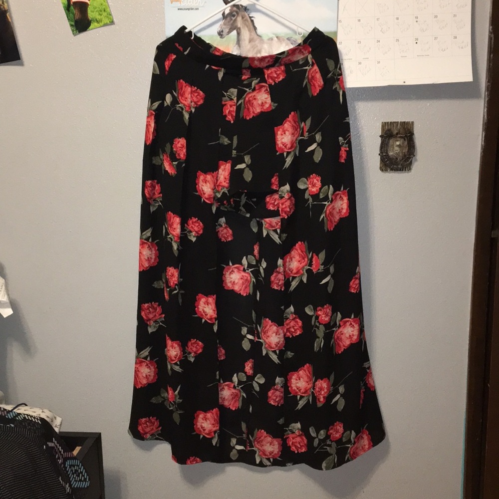 Size Large shorts with cape.